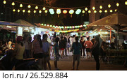 NHA TRANG, VIETNAM - OCTOBER 1, 2016: Night festival on the street in Vietnam. Yen Sao Khanh Hoa shopping street. Редакционное видео, видеограф Mikhail Davidovich / Фотобанк Лори