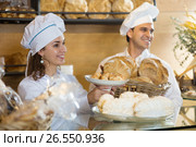 Portrair of two smiling chef pastry in italian bakery. Стоковое фото, фотограф Татьяна Яцевич / Фотобанк Лори