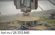 The CNC machine for glass processing polishes the facet on the round mirror. Стоковое видео, видеограф Андрей Радченко / Фотобанк Лори