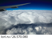 Airplane Wing view from Window during Flight. Стоковое фото, фотограф Roman Barelko / Фотобанк Лори
