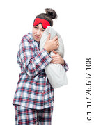 Sleepy woman in pajamas hugging her favorite pillow against white background. Стоковое фото, фотограф Константин Лабунский / Фотобанк Лори