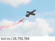 Самолет Aermacchi MB-339 пилотажной группы "Аль Фурсан"  в полете. Фрагмент показательного выступления на авиашоу МАКС-2017. Редакционное фото, фотограф Виктор Карасев / Фотобанк Лори