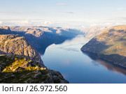 Preikestolen or Prekestolen or Preacher's Pulpit or Pulpit Rock, is a famous tourist attraction in Forsand, Ryfylke, Norway (2017 год). Стоковое фото, фотограф Алексей Ширманов / Фотобанк Лори