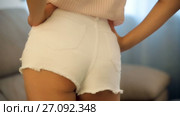 Back view of sexy girl body in white denim cut-offs shorts. Стоковое видео, видеограф Яков Филимонов / Фотобанк Лори