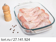 Chicken drumsticks with pepper on a white background. Стоковое фото, фотограф Юлия Бабкина / Фотобанк Лори
