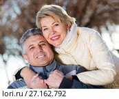 Mature married couple embracing on sunny day. Стоковое фото, фотограф Яков Филимонов / Фотобанк Лори