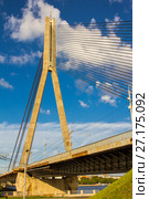 RIGA, LATVIA Vansu Bridge over Daugava River in Riga, Latvia. One of five big bridges in Riga and the only cable-stayed (2017 год). Стоковое фото, фотограф Алексей Ширманов / Фотобанк Лори