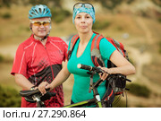 Portrait male  and women cyclist with a mountain bike. Стоковое фото, фотограф Наталья Давыдова / Фотобанк Лори