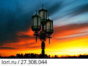 Lanterns in beams of a decline bewitching by paints. Стоковое фото, фотограф Курганов Александр / Фотобанк Лори