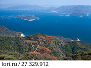 Fine clear day for looking at the Shikoku Mountain Range and the dotted island of Seto Inland Sea from Shishiiwa observatory. The Itsukushima (Miyajima) island, Japan (2013 год). Стоковое фото, фотограф Кекяляйнен Андрей / Фотобанк Лори