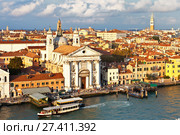 Italy.Venice. View on Cathedral of Santa Maria del Rosario (Gesuati) and Zattere water bus stop from above in the rays of the setting sun (2016 год). Стоковое фото, фотограф Виктория Катьянова / Фотобанк Лори