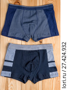 cotton panties for boy clothes on wooden boards top view. Стоковое фото, фотограф Константин Лабунский / Фотобанк Лори