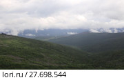 Low clouds and fog over mountains. Стоковое видео, видеограф Евгений Ткачёв / Фотобанк Лори