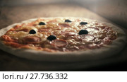Pizza baking in oven. Стоковое видео, видеограф Игорь Кузнецов / Фотобанк Лори