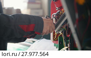 Electrician's hands installing energy system on machinery industry. Стоковое видео, видеограф Константин Шишкин / Фотобанк Лори