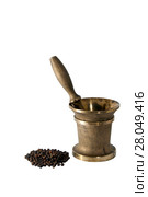 Antique patined bronze mortar and a handful of black pepper peas isolated. Стоковое фото, фотограф Евгений Харитонов / Фотобанк Лори
