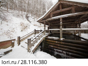 Wooden old-style structure with baptistery in Russian Orthodox Monastery at winter. Стоковое фото, фотограф Losevsky Pavel / Фотобанк Лори