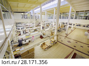 MOSCOW - SEP 15, 2016: People in workshop of cosmetics factory Freedom was created on basis of first in Russia perfume factory Rally and Co, which was founded in 1843. Редакционное фото, фотограф Losevsky Pavel / Фотобанк Лори