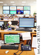 MOSCOW, RUSSIA - APR 25, 2016: Workplace with two monitors in Moscow city telephone network. Редакционное фото, фотограф Losevsky Pavel / Фотобанк Лори