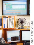 MOSCOW, RUSSIA - APR 25, 2016: Workplace in Moscow city telephone network. Редакционное фото, фотограф Losevsky Pavel / Фотобанк Лори