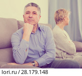 sad mature couple quarreling at home with each other. Стоковое фото, фотограф Яков Филимонов / Фотобанк Лори