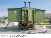 Российская кухня столовая, возимая в автомобильном контейнере КСВК-240/24 на Международном военно-техническом форуме "Армия-2017", вид сзади. Кубинка, военно-патриотический парк "Патриот" Редакционное фото, фотограф Малышев Андрей / Фотобанк Лори