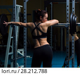 Woman with the barbell in the gym. Стоковое фото, фотограф Владимир Мельников / Фотобанк Лори