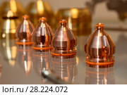 Replaceable nozzles for plasma cutting machine. Стоковое фото, фотограф Андрей Радченко / Фотобанк Лори