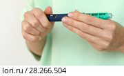 Diabetes turn insulin pen correct dose injection. Стоковое фото, фотограф Ekaterina Demidova / Фотобанк Лори