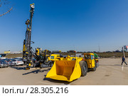 Погрузочно-доставочная машина Atlas Copco Scooptram ST7, буровая установка SmartROC D65. «Крокус Экспо» (2018 год). Редакционное фото, фотограф Светлана Голинкевич / Фотобанк Лори