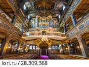 Interior of magnificently decorated wooden Protestant Church of Peace in Swidnica, UNESCO World Cultural Heritage, Poland. Стоковое фото, агентство BE&W Photo / Фотобанк Лори