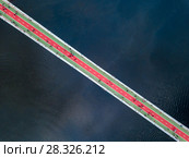 Aerial top view of pedestrian and cycling path lane on Park bridge and Dnieper river from above in city Kyiv , Ukraine. Стоковое фото, фотограф Ярослав Данильченко / Фотобанк Лори