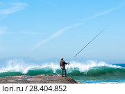 A fisherman with a fishing rod on the pier. Стоковое фото, фотограф Ольга Визави / Фотобанк Лори
