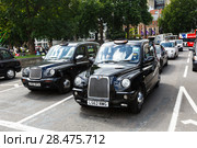 Legendary London taxi cab on the streets of London (2017 год). Редакционное фото, фотограф Ирина Мойсеева / Фотобанк Лори