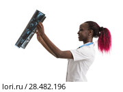 Closeup portrait of intellectual african woman healthcare doctor with white labcoat, looking at neck x-ray radiographic image, ct scan, mri, isolated white background. Radiology department. Стоковое фото, агентство Ingram Publishing / Фотобанк Лори