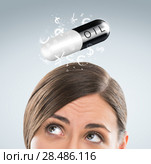 Investment concept. Pretty business woman with currency symbols. Стоковое фото, фотограф Kirill Kedrinskiy / Ingram Publishing / Фотобанк Лори