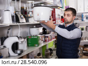 male is standing with new multivariate. Стоковое фото, фотограф Яков Филимонов / Фотобанк Лори
