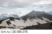 Panorama of Caucasian mountains from Rosa Khutor resort In the rain in Russia. Стоковое видео, видеограф Володина Ольга / Фотобанк Лори