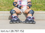 Small children's legs with roller skates. Стоковое фото, фотограф Акиньшин Владимир / Фотобанк Лори