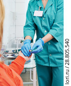 Blood test with disposable lancelet. nurse takes sample from finger. Стоковое фото, фотограф Дмитрий Калиновский / Фотобанк Лори
