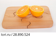 Orange pieces on a wooden board and knife. Стоковое фото, фотограф Георгий Ильин / Фотобанк Лори