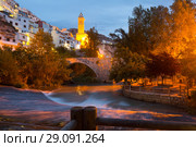 night view of Alcala del Jucar with belltower and bridge (2016 год). Стоковое фото, фотограф Яков Филимонов / Фотобанк Лори