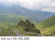 Старинная башня Курта и Тага. Горный посёлок Верхний Фиагдон, республика Северная Осетия (2017 год). Стоковое фото, фотограф Ирина Носова / Фотобанк Лори