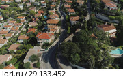 The city of Nice in the south of France on the azure coast is a view from above on the roofs of houses and roads. Стоковое видео, видеограф Aleksejs Bergmanis / Фотобанк Лори