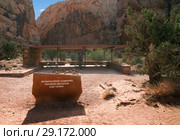Stone with a description of the attractions on the trail. Capitol Reef National Park, Utah, USA (2014 год). Стоковое фото, фотограф Ирина Кожемякина / Фотобанк Лори