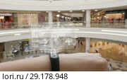 Young girl press on futuristic user interface concept bracelet. Graphical User Interface - GUI. Head up Display - HUD. Internet of things. Стоковое видео, видеограф Dzmitry Astapkovich / Фотобанк Лори