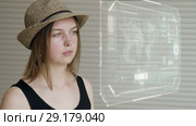 Young girl press on futuristic user interface concept screen. Graphical User Interface - GUI. Head up Display - HUD. Internet of things. Стоковое видео, видеограф Dzmitry Astapkovich / Фотобанк Лори