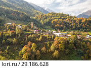 Picturesque autumn landscape. Zegani village in Upper Svaneti surrounded by mountains. Georgia. Стоковое фото, фотограф Юлия Бабкина / Фотобанк Лори
