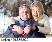 Mature married couple embracing on sunny day. Стоковое фото, фотограф Яков Филимонов / Фотобанк Лори