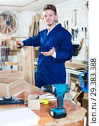 Male worker checking measurements. Стоковое фото, фотограф Яков Филимонов / Фотобанк Лори
